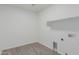 Laundry room with essential hookups and space for appliances, offering convenience and functionality at 9430 W Sandstone Mountain Dr, Casa Grande, AZ 85194
