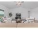 Bright living room featuring stylish modern furniture and neutral color palette with decorative accessories at 9430 W Sandstone Mountain Dr, Casa Grande, AZ 85194