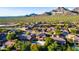 Beautiful aerial view of a home with a pool near the McDowell Sonoran Preserve at 10843 E Acacia Dr, Scottsdale, AZ 85255
