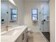Modern bathroom with a walk-in glass shower, and light wood flooring at 10843 E Acacia Dr, Scottsdale, AZ 85255