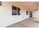 Covered back patio offers views of the expansive desert backyard at 6515 N Loma Ct, Casa Grande, AZ 85194