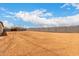 Large desert backyard featuring a block wall for privacy and future landscaping opportunities at 6515 N Loma Ct, Casa Grande, AZ 85194