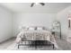 Bedroom with natural light, a soft rug, comfortable bed, and a sleek full-length mirror at 6515 N Loma Ct, Casa Grande, AZ 85194