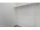 This is a closet with a wood bar for hanging clothes at 6515 N Loma Ct, Casa Grande, AZ 85194
