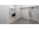 Spacious closet with ample storage, shelving, and hanging space, leading into laundry area at 6515 N Loma Ct, Casa Grande, AZ 85194