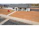 Single-story home with low-maintenance landscaping and charming curb appeal at 6515 N Loma Ct, Casa Grande, AZ 85194