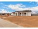 Beautiful single-story home featuring a charming facade and low maintenance desert landscaping at 6515 N Loma Ct, Casa Grande, AZ 85194