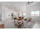 Bright, open-concept living space with a kitchen, dining area, and living room at 6515 N Loma Ct, Casa Grande, AZ 85194