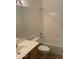 Clean bathroom with a shower over tub, a large mirror and a wooden vanity at 8659 E Mescal St, Scottsdale, AZ 85260