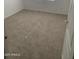 Bedroom features neutral carpet, bright walls, and a door at 8659 E Mescal St, Scottsdale, AZ 85260