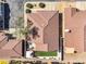 Aerial view of backyard featuring outdoor seating, firepit, and artificial turf at 8972 E Arizona Park Pl, Scottsdale, AZ 85260