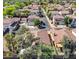 Residential neighborhood showcasing well-maintained homes with mature trees and landscaping at 8972 E Arizona Park Pl, Scottsdale, AZ 85260