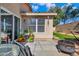 View of outdoor patio with seating area, firepit, and potted plants at 8972 E Arizona Park Pl, Scottsdale, AZ 85260