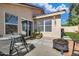 Outdoor patio area with table, chairs, and firepit, great for entertaining guests at 8972 E Arizona Park Pl, Scottsdale, AZ 85260
