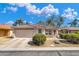 Inviting single-Gathering home featuring a two-car garage and low-maintenance landscaping at 8972 E Arizona Park Pl, Scottsdale, AZ 85260