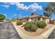 Charming single-story home with well-maintained landscaping and a tile roof at 8972 E Arizona Park Pl, Scottsdale, AZ 85260