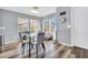 Eat-in kitchen area with bright natural light, dining table, and view of the backyard at 8972 E Arizona Park Pl, Scottsdale, AZ 85260