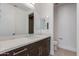 Bathroom with sleek countertop vanity and modern fixtures, complemented by a large mirror at 100 W Northern Ave # 15, Phoenix, AZ 85021