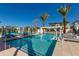 Beautiful community pool area with lounge chairs and shade canopies at 100 W Northern Ave # 15, Phoenix, AZ 85021