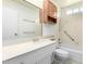 Bright bathroom featuring vanity, mirror, and tub with shower at 10418 W Corte Del Sol Oeste --, Sun City, AZ 85351