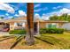 Charming brick home with manicured lawn and desert landscaping under a sunny sky at 10418 W Corte Del Sol Oeste --, Sun City, AZ 85351