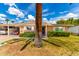 Charming brick home with manicured lawn and desert landscaping under a sunny sky at 10418 W Corte Del Sol Oeste --, Sun City, AZ 85351