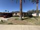 Traditional-style brick home with white shutters, and tidy landscaping at 10418 W Corte Del Sol Oeste --, Sun City, AZ 85351