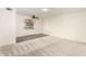 Open living space with hardwood floors and carpet, adjacent to a kitchen with updated cabinets at 10418 W Corte Del Sol Oeste --, Sun City, AZ 85351