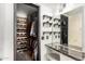 Organized walk-in closet with shelving and storage solutions, maximizing space and convenience at 10461 W Hutton Dr, Sun City, AZ 85351