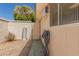 Low maintenance side yard with gravel cover and a block wall at 10461 W Hutton Dr, Sun City, AZ 85351