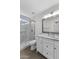 Bathroom featuring shower with marble finishes, toilet, and vanity at 1057 W Mesquite Ave, Apache Junction, AZ 85120
