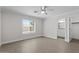 Bedroom with new flooring with walk in closet and en suite bathroom at 1057 W Mesquite Ave, Apache Junction, AZ 85120