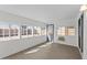 Bonus room features new floors and large window, with backyard views at 1057 W Mesquite Ave, Apache Junction, AZ 85120