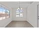 Dining room featuring bright light from two large windows at 1057 W Mesquite Ave, Apache Junction, AZ 85120