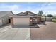 A charming single-Gathering home offers a well-manicured yard and an attached two-car garage at 1057 W Mesquite Ave, Apache Junction, AZ 85120