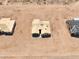 New construction home featuring gabled roof and desert landscape on an expansive lot, ready for personalization at 10907 W Woodruff Rd, Casa Grande, AZ 85194