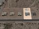 Aerial view of homes under construction on large lots in a developing desert community at 10947 W Woodruff Rd, Casa Grande, AZ 85194
