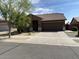 Charming single-story home with a well-manicured lawn and a spacious two-car garage at 11277 W Buchanan St, Avondale, AZ 85323