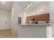 Modern kitchen features granite countertops and convenient breakfast bar seating at 11277 W Buchanan St, Avondale, AZ 85323
