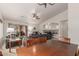 Dining and living room with high ceiling, comfortable sofas, and modern lighting at 11277 W Buchanan St, Avondale, AZ 85323