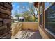 This outdoor patio has brick flooring and beige surrounding walls, great for entertaining at 12047 W Red Hawk Dr, Peoria, AZ 85383