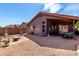 Enjoy the backyard patio with a covered area and the low-maintenance desert landscaping at 12415 N 41St Dr, Phoenix, AZ 85029