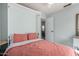 Comfortable bedroom with a Murphy bed, neutral walls, and soft, inviting natural light at 12415 N 41St Dr, Phoenix, AZ 85029