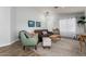 Inviting living room with contemporary decor, neutral paint, and comfortable seating arrangements at 12415 N 41St Dr, Phoenix, AZ 85029