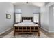 Bedroom with a ceiling fan, natural light, and wood look flooring at 12415 N 41St Dr, Phoenix, AZ 85029