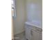 Bathroom with gray vanity, white countertop, modern fixtures, and tiled flooring and natural light at 13250 W Eagle Feather Rd, Peoria, AZ 85383