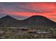Community center at sunset, set against a backdrop of mountains and a vibrant sky at 13250 W Eagle Feather Rd, Peoria, AZ 85383