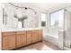 Bright bathroom features a double vanity, soaking tub, and large window for ample natural light at 1344 N Constellation Way, Gilbert, AZ 85234