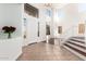 Bright foyer with high ceilings, decorative windows and attractive staircase at 1344 N Constellation Way, Gilbert, AZ 85234