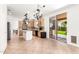 Bright kitchen with a center island, stainless appliances, and seamless access to the backyard at 1344 N Constellation Way, Gilbert, AZ 85234